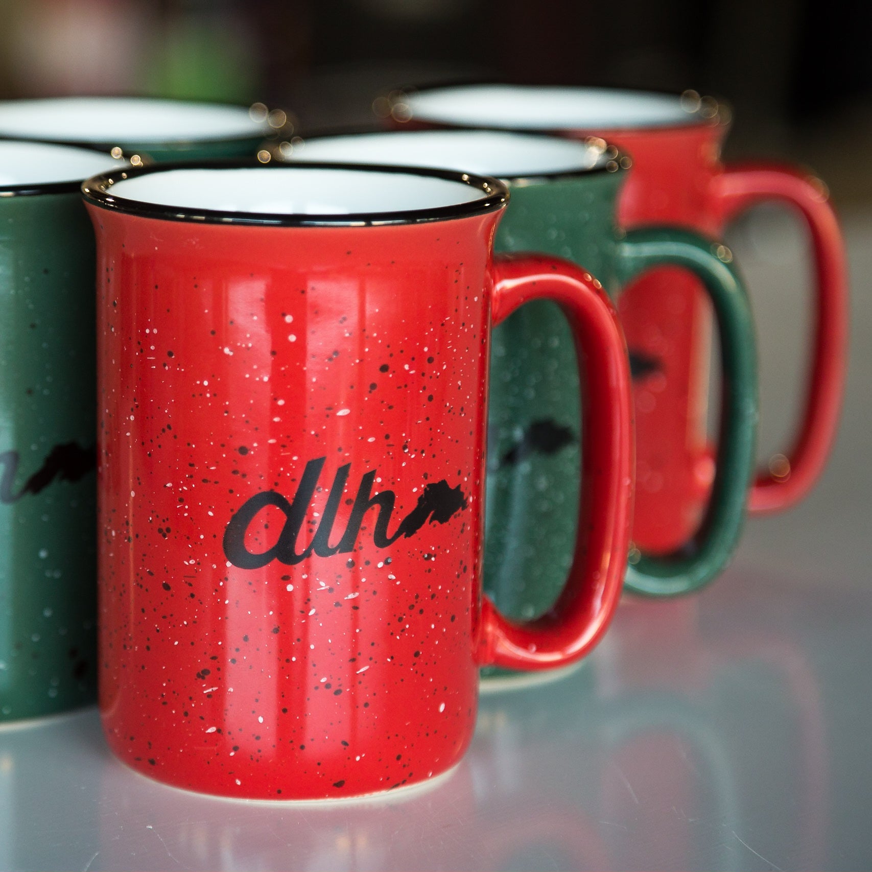 DLH branded holiday mugs.